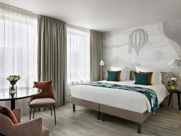 Citadines Confluent Nantes : photo 1 de la chambre studio deluxe avec douche