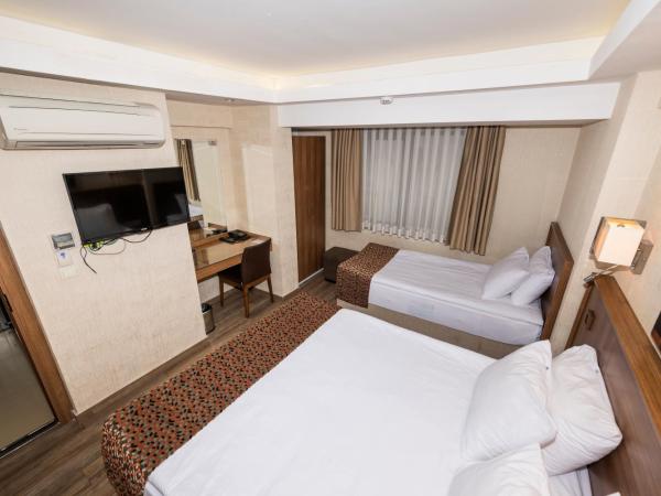 BGuest Hotel & Residence : photo 3 de la chambre chambre triple