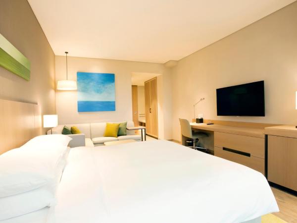 Hyatt Place Sanya City Center : photo 7 de la chambre chambre lit king-size avec canapé-lit