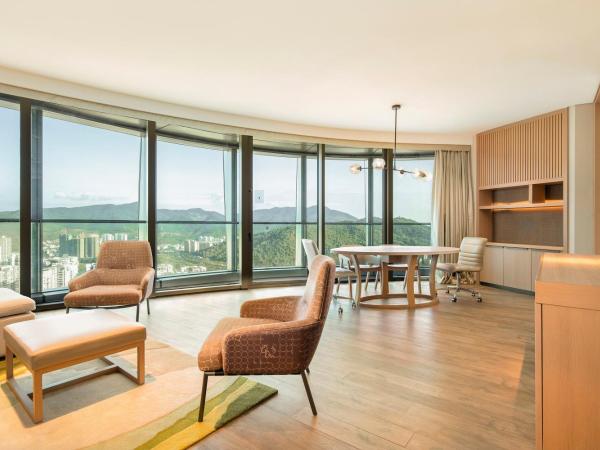 Hyatt Place Sanya City Center : photo 1 de la chambre suite lit king-size avec canapé-lit