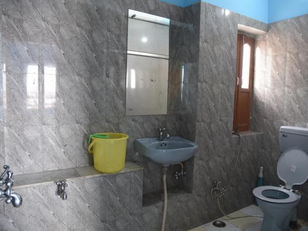 Sunshine Guest House & Restaurant : photo 7 de la chambre chambre familiale avec salle de bains privative