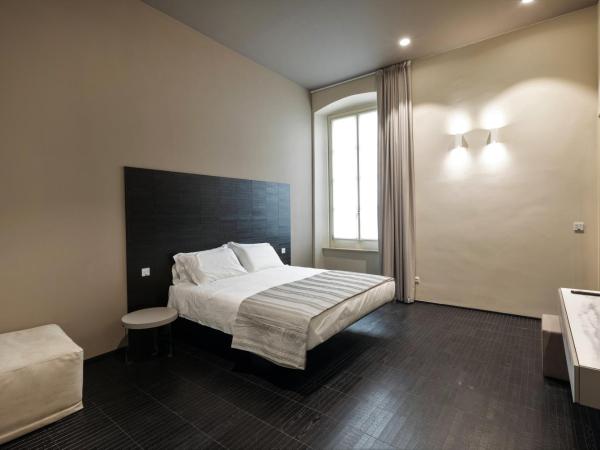 Salina Luxury Suites : photo 1 de la chambre chambre lit king-size