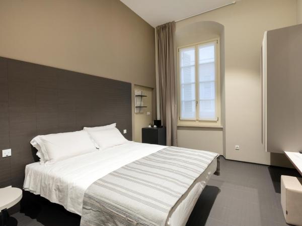 Salina Luxury Suites : photo 1 de la chambre chambre deluxe