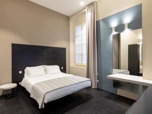 Salina Luxury Suites : photo 1 de la chambre chambre lit king-size deluxe