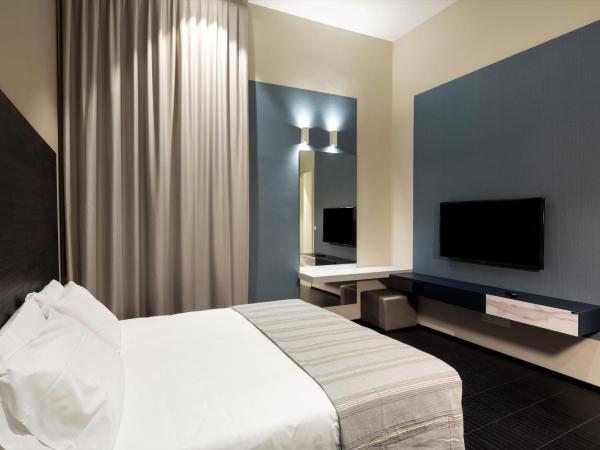 Salina Luxury Suites : photo 2 de la chambre chambre lit king-size deluxe