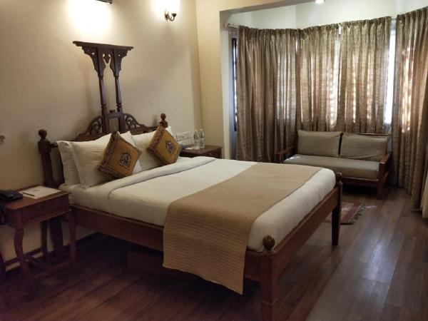 WelcomHeritage Mani Mansion : photo 2 de la chambre chambre simple exécutive