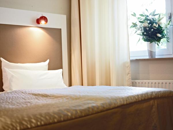 Hotel Domicil Hamburg by Golden Tulip : photo 1 de la chambre chambre lits jumeaux standard