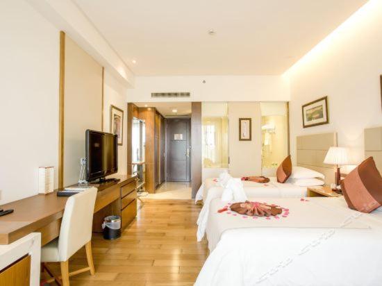 Mingshen Golf & Bay Resort Sanya : photo 2 de la chambre chambre lits jumeaux deluxe avec vue sur le jardin