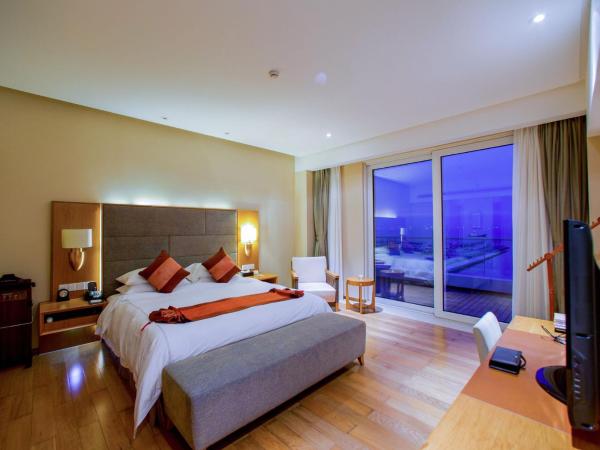 Mingshen Golf & Bay Resort Sanya : photo 4 de la chambre suite deluxe - vue sur mer