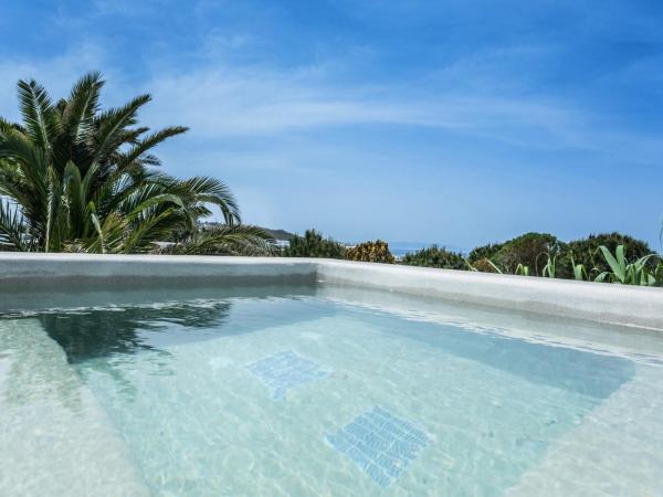 Ostraco Suites : photo 6 de la chambre suite avec bain à remous extérieur - vue sur mer 