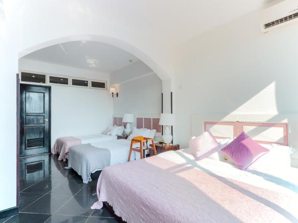 Pousada de Coloane Boutique Hotel : photo 2 de la chambre chambre familiale avec balcon et vue sur la mer