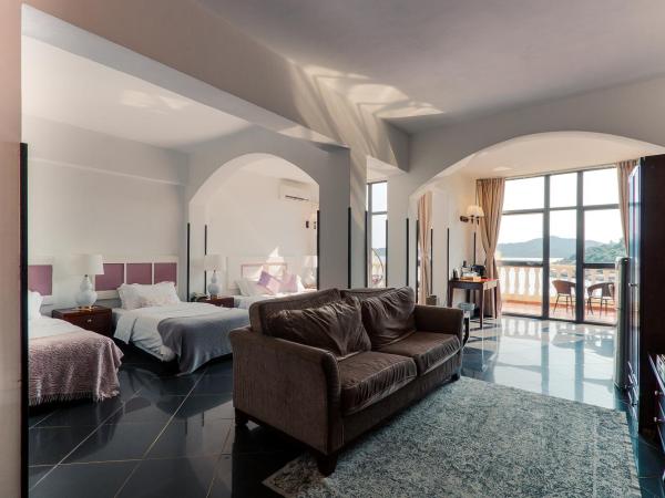 Pousada de Coloane Boutique Hotel : photo 5 de la chambre chambre familiale avec balcon et vue sur la mer