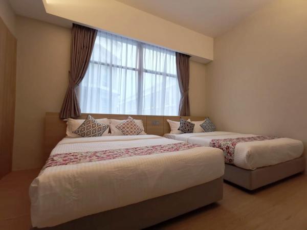 Oikos Poshtel : photo 1 de la chambre chambre exécutive avec 2 lits queen-size