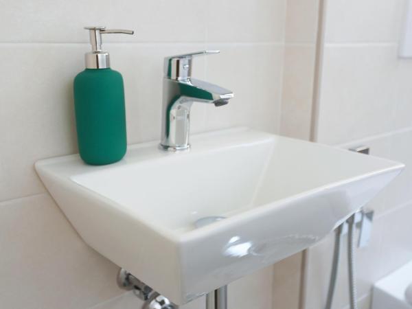 Residenza Leone : photo 2 de la chambre grande chambre double ou lits jumeaux avec salle de bains privative