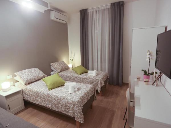 Residenza Leone : photo 4 de la chambre grande chambre double ou lits jumeaux avec salle de bains privative