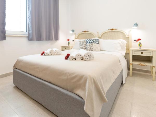 Don Vittorio Country Village : photo 2 de la chambre appartement avec balcon