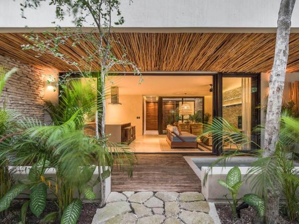 Copal Tulum Hotel : photo 2 de la chambre appartement de luxe jungle 1 chambre avec 2 lits simples, 1 canapé-lit king-size et piscine privée - vue sur jardin