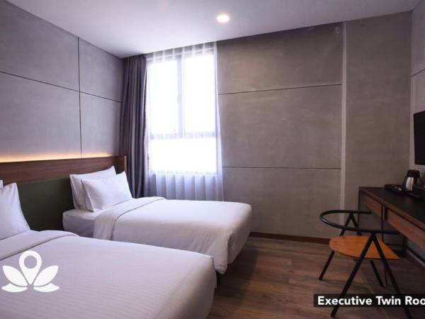 Ceria Hotel : photo 3 de la chambre chambre lits jumeaux exécutive