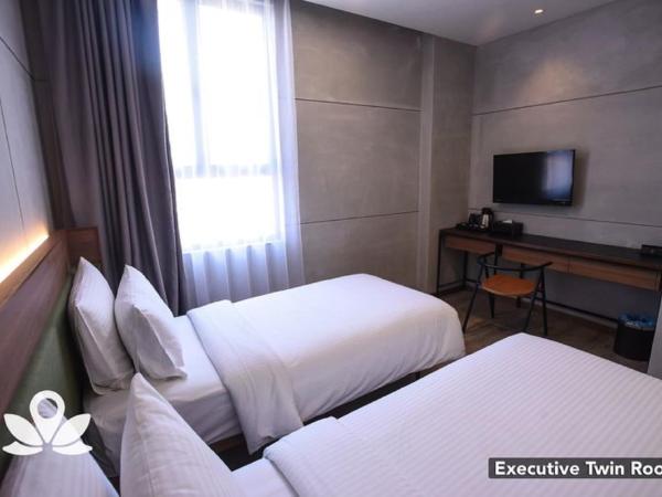 Ceria Hotel : photo 4 de la chambre chambre lits jumeaux exécutive