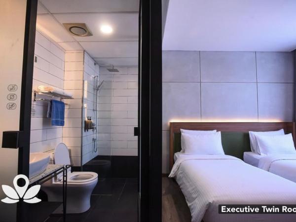 Ceria Hotel : photo 6 de la chambre chambre lits jumeaux exécutive