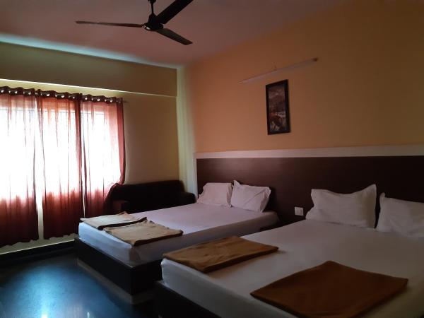 Sapphire Inn : photo 9 de la chambre chambre deluxe avec 2 lits queen-size