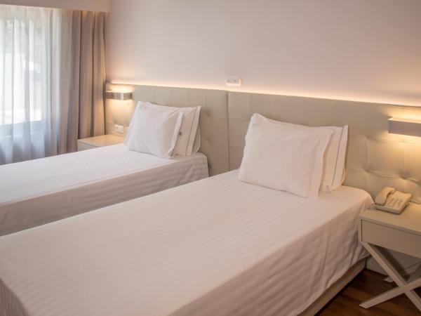 Hotel Travel Park Lisboa : photo 3 de la chambre chambre double ou lits jumeaux