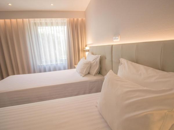 Hotel Travel Park Lisboa : photo 7 de la chambre chambre double ou lits jumeaux avec parking gratuit