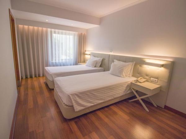 Hotel Travel Park Lisboa : photo 8 de la chambre chambre double ou lits jumeaux avec parking gratuit