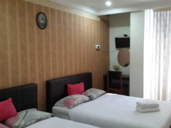 Hotel Tropicanna Pulai Point : photo 2 de la chambre chambre familiale