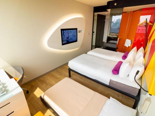 Ibis Styles Singapore On Macpherson : photo 4 de la chambre chambre triple standard avec 3 lits simples