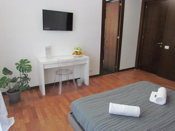 Room 56 - Le Dimore : photo 5 de la chambre suite lit king-size avec baignoire spa