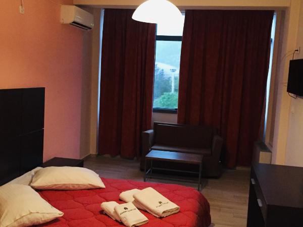 Acharnis Kavallari Hotel Suites : photo 1 de la chambre chambre triple Économique