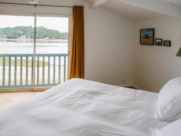 Htel Les Hortensias du Lac : photo 3 de la chambre suite avec vue sur lac 