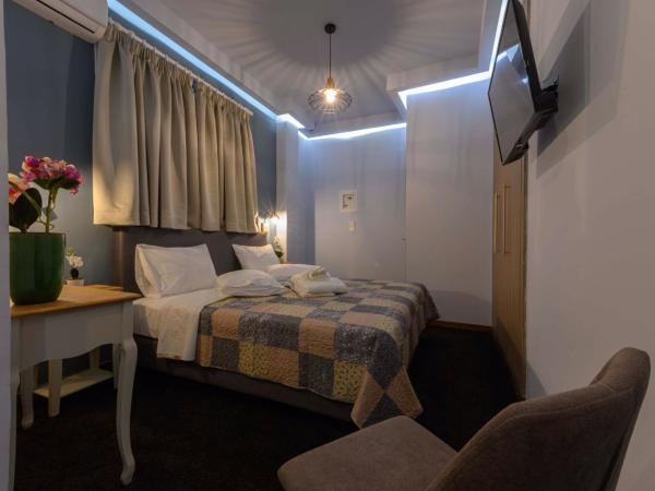 Central Rooms : photo 1 de la chambre chambre double ou lits jumeaux standard avec balcon