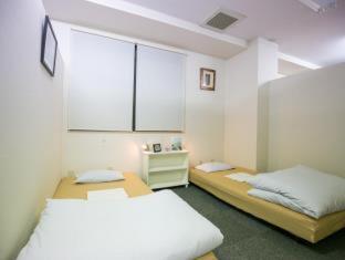 123 Guesthouse : photo 10 de la chambre room #243680416