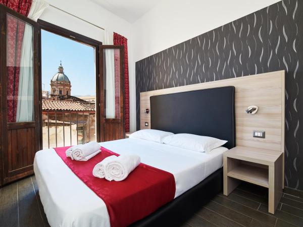 La Terrazza sul Centro : photo 2 de la chambre chambre lit queen-size 