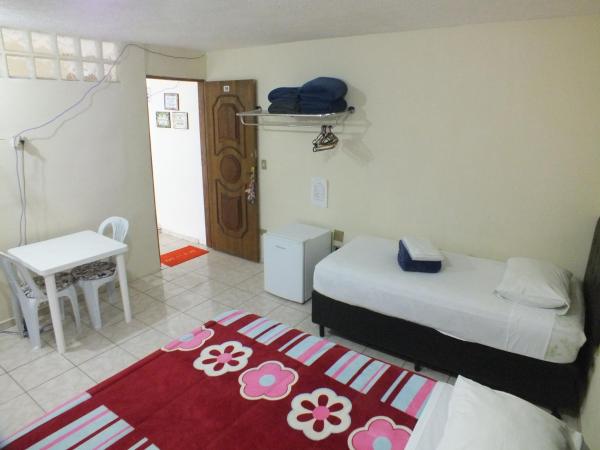 Hospedagem Henri Dunant : photo 3 de la chambre chambre familiale avec salle de bains privative