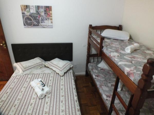 Hospedagem Henri Dunant : photo 2 de la chambre chambre quadruple avec salle de bains privative