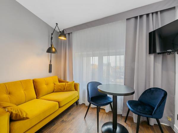 Aparthotel Krzywa Kamienica : photo 2 de la chambre suite deluxe mansardée