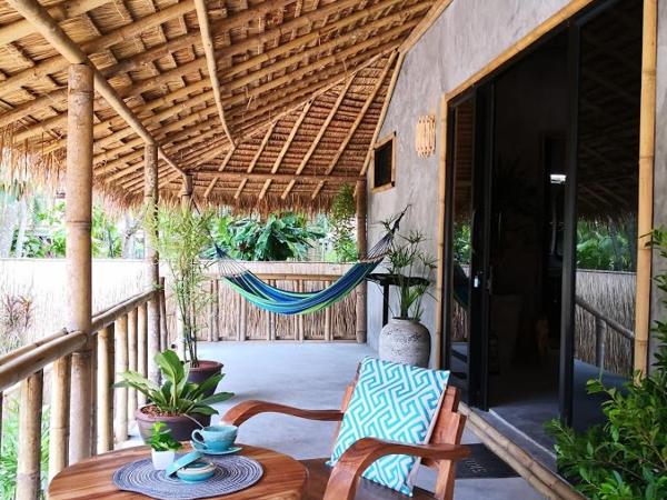 The Lazy Lodge : photo 8 de la chambre bungalow - côté plage