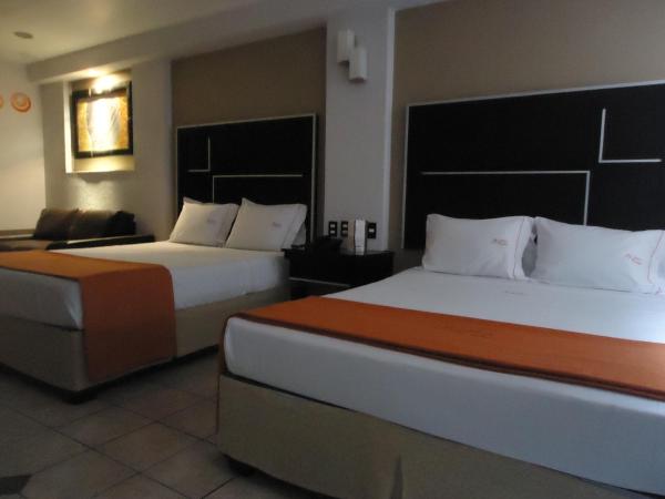 Hotel Estadio : photo 8 de la chambre chambre de luxe avec 2 lits queen-size.