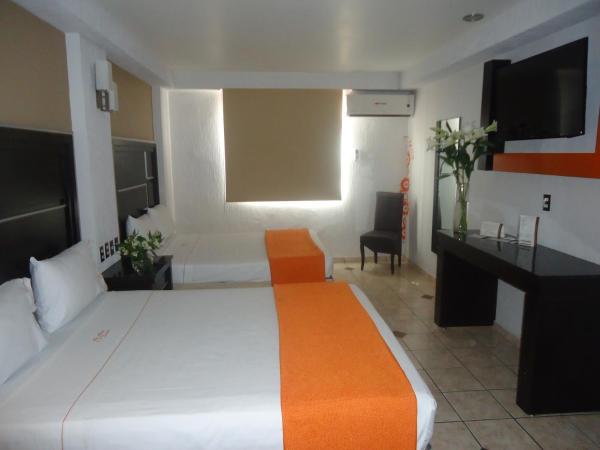 Hotel Estadio : photo 9 de la chambre chambre de luxe avec 2 lits queen-size.