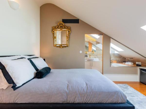 Maison Cabral : photo 5 de la chambre chambre double deluxe avec baignoire