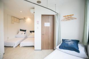 123 Guesthouse : photo 10 de la chambre room #243680421