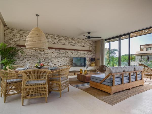 Copal Tulum Hotel : photo 7 de la chambre appartement de luxe jungle 1 chambre avec 2 lits simples, 1 canapé-lit king-size et terrasse - vue sur jardin