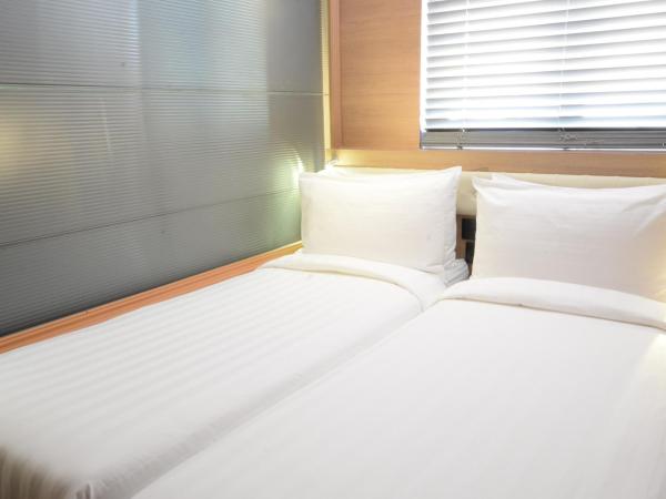 Bluejay Residences : photo 5 de la chambre chambre lits jumeaux