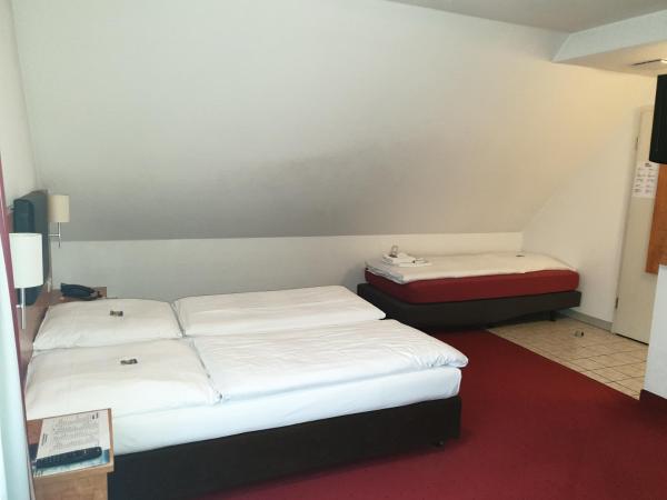 Hotel Neuwirtshaus - Superior : photo 1 de la chambre chambre triple