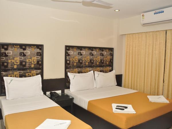 City Home : photo 4 de la chambre chambre deluxe double ou lits jumeaux