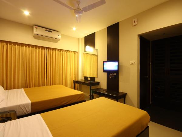 City Home : photo 2 de la chambre chambre triple deluxe