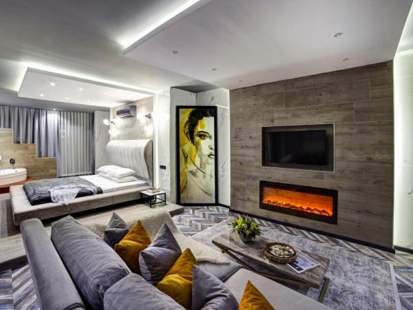 Walton Residence Sisli : photo 3 de la chambre suite exécutive avec jacuzzi et cheminée